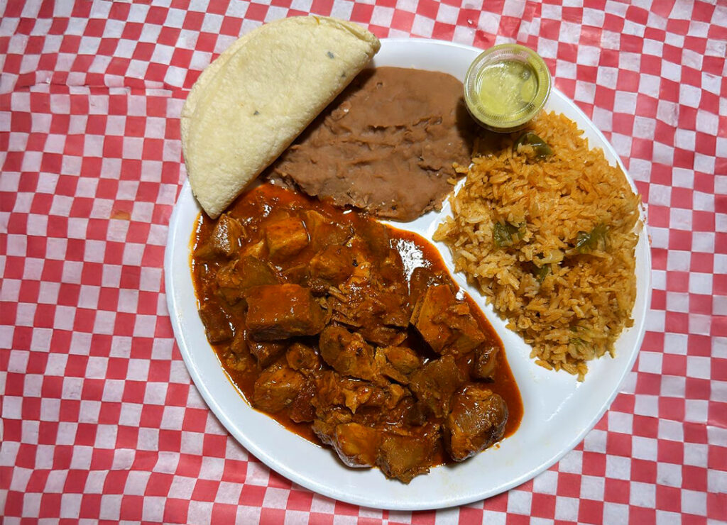 Asada de Puerco con arroz y frijoles